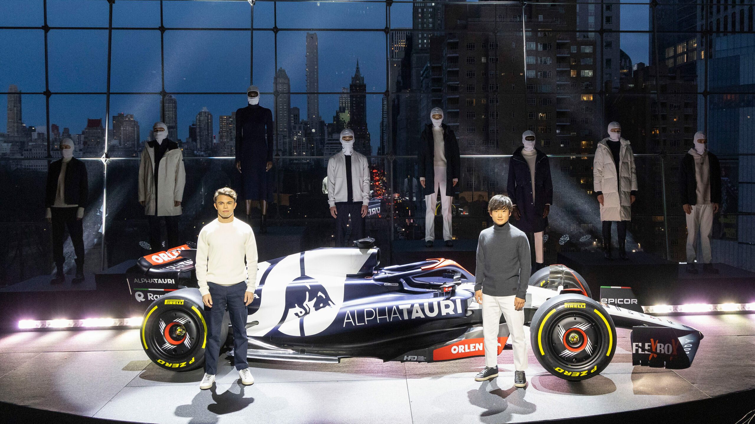 Scuderia AlphaTauri Formula One drivers Nyck De Vries and Yuki Tsunoda in front of the 2023 car during the Scuderia AlphaTauri Season Launch at Lincoln Center in New York, NY on 11 February, 2023 (Photo by Colin Kerrigan)